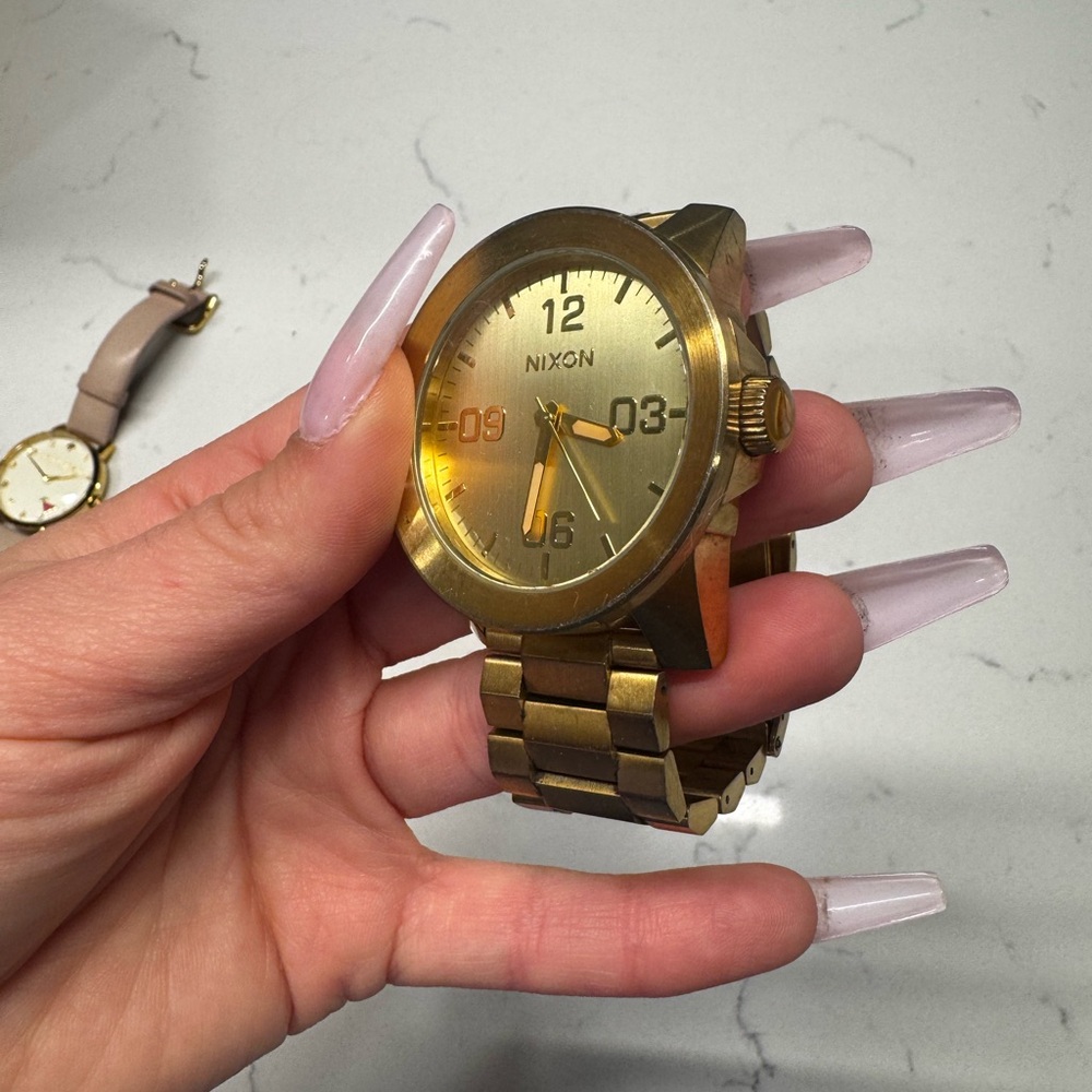 Nixon Gold Smartwatch with Bold Design - Picture 2 of 3